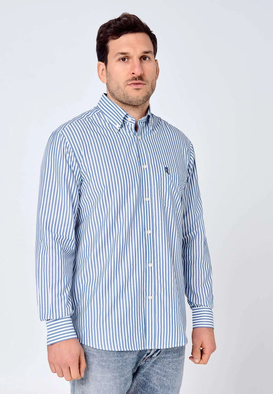 Camisa de hombre de manga larga en popelín de rayas azules y blancas, corte clásico con bolsillo y tejido suave.
