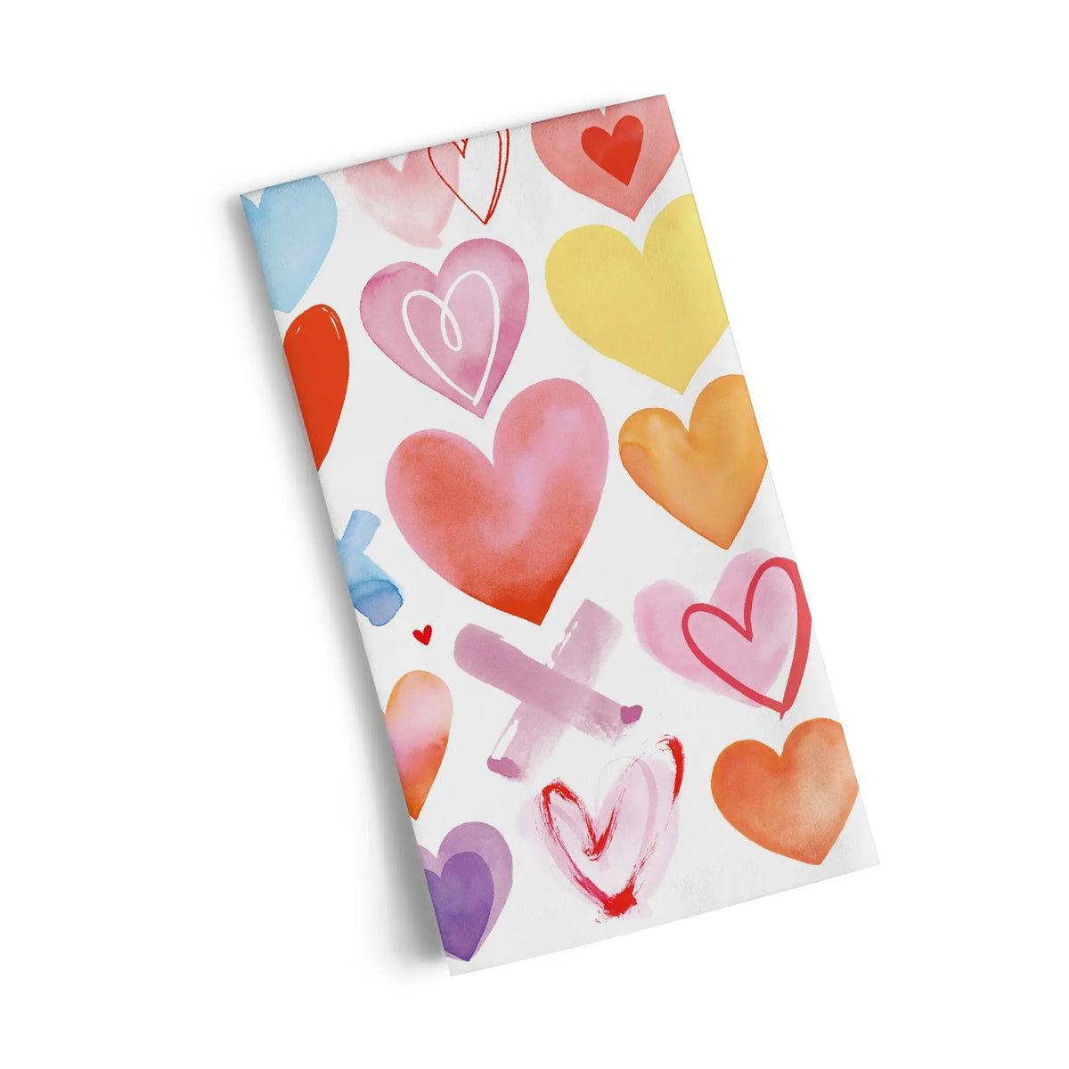 White cotton tea towel featuring a scattered watercolor pattern of colorful hearts and pink painted crosses.