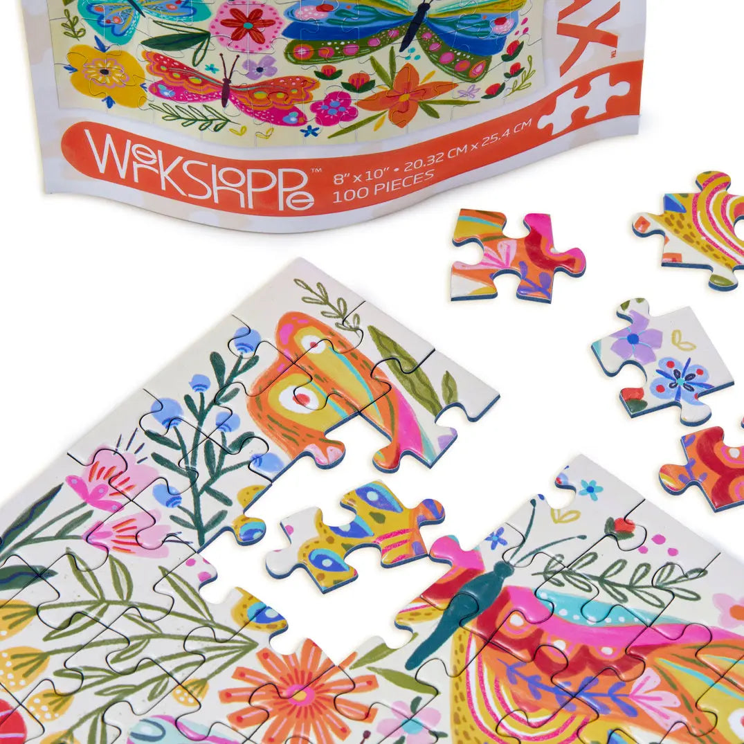 Butterfly and floral 100-piece puzzle with colorful, whimsical illustrations on a light background.