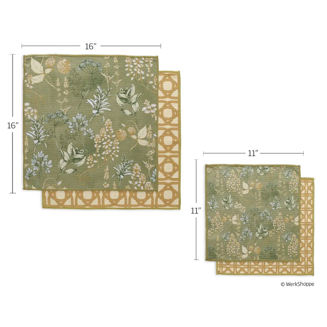 Two square towels with a sage green herb print on one side and a gold geometric pattern on the other, sized 16" and 11".