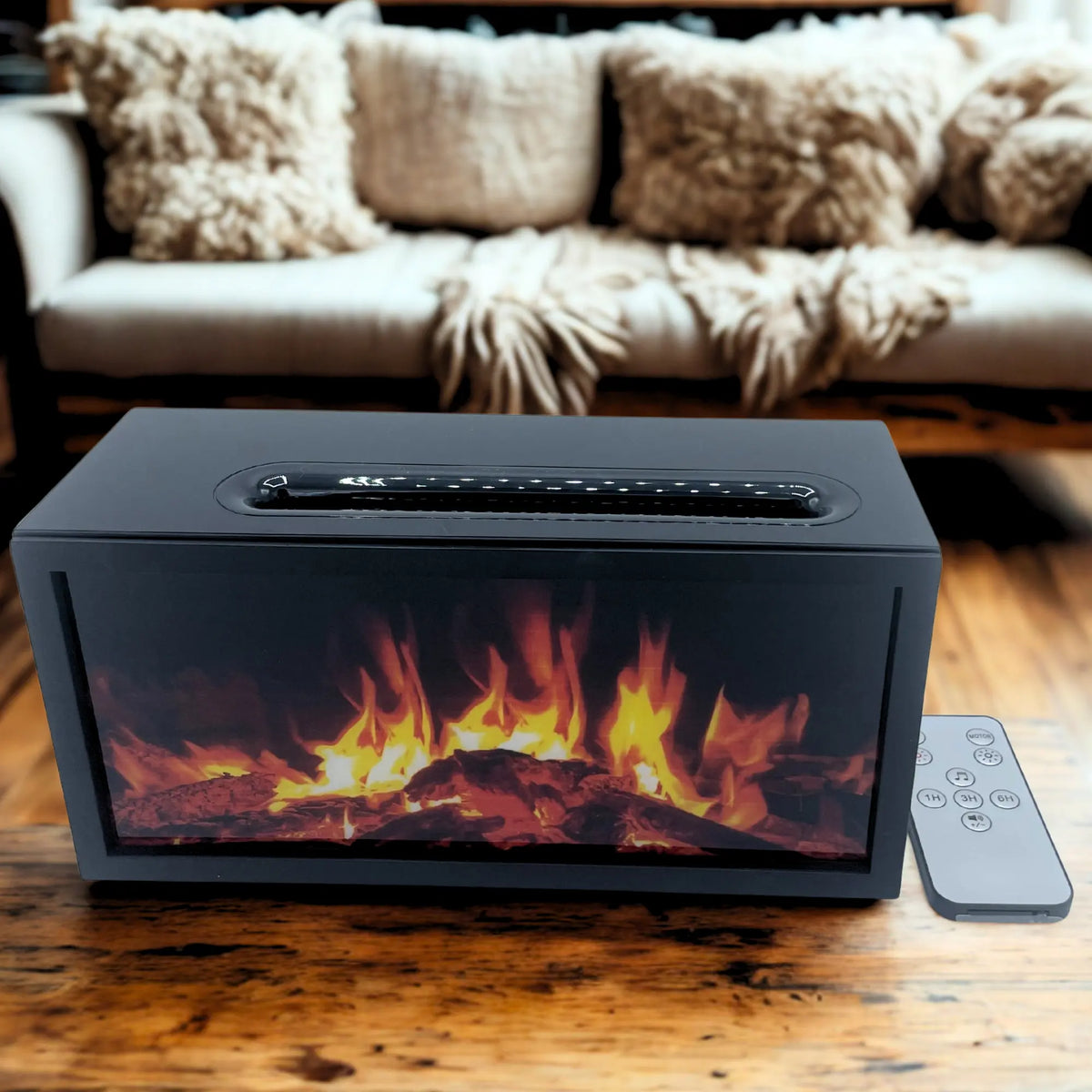 Difusor negro rectangular tipo chimenea con efecto llama realista y mando a distancia, sobre mesa de madera.