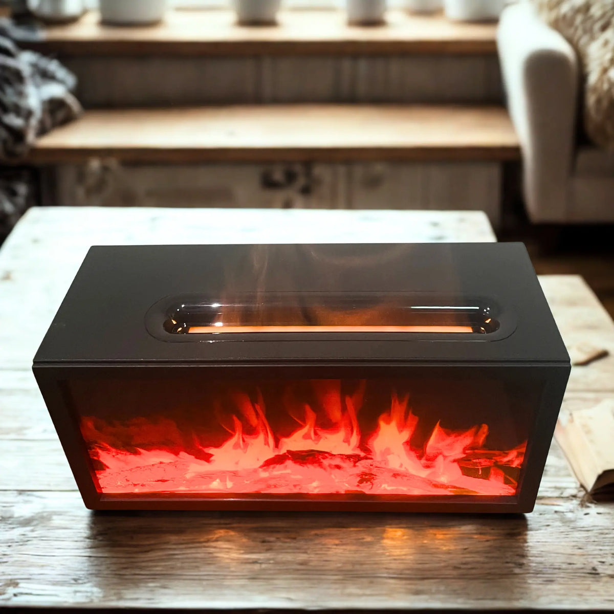 Difusor USB negro rectangular con efecto de llama realista, luz cálida y salida de vapor sobre una mesa de madera.