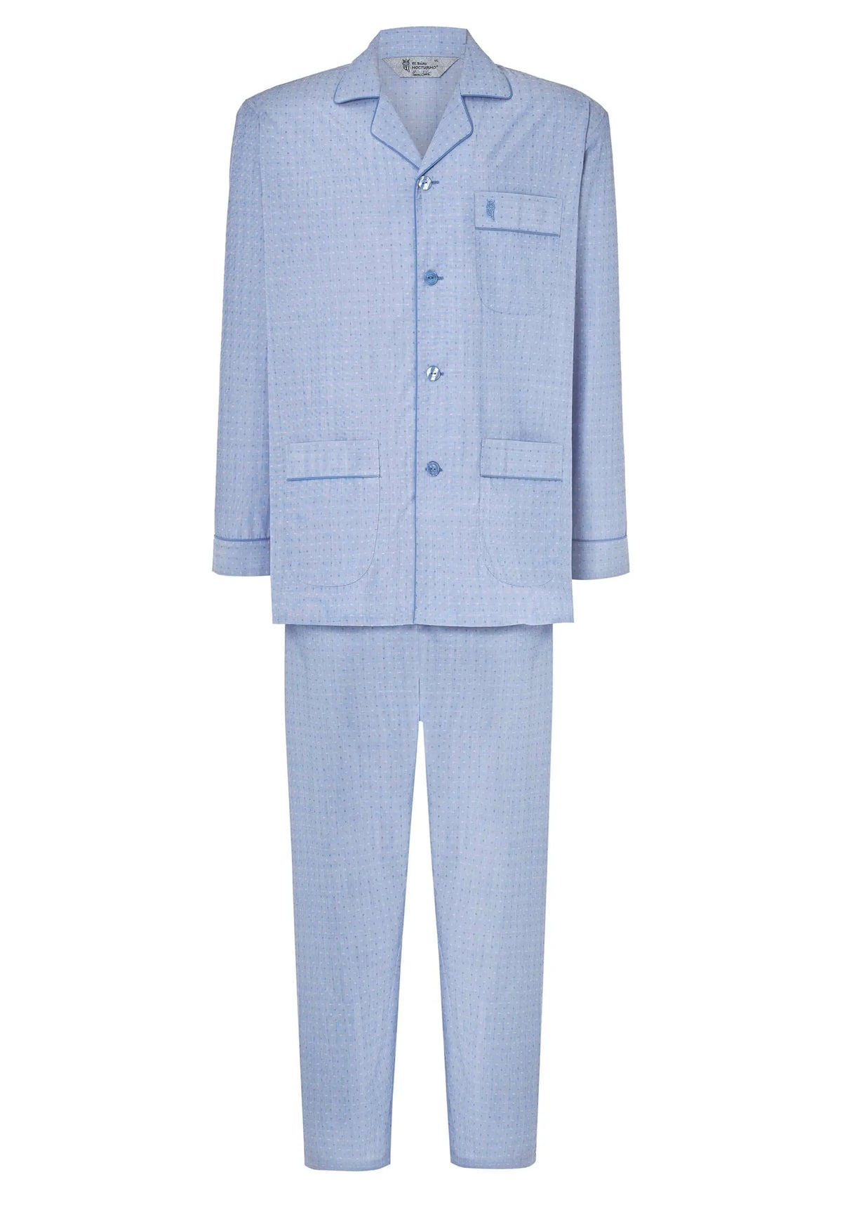 Pijama largo de hombre azul con solapa, botones, bolsillos y estampado de pequeños puntos, tejido liso y estilo clásico.