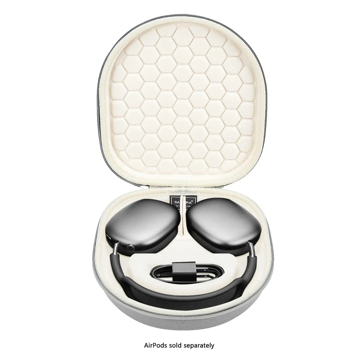 Grey hard-shell travel case for AirPods Max, featuring a beige honeycomb-patterned interior and molded storage.
