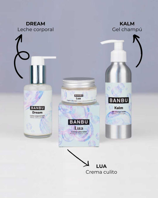 Pack de cosmética infantil Banbu: leche corporal, gel-champú y crema en envases sostenibles con diseño de burbujas.