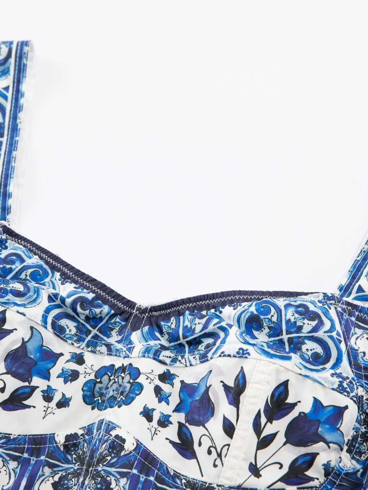 Bustier top in white cotton with a blue and pink Italian Majolica tile and floral print, featuring thick straps.