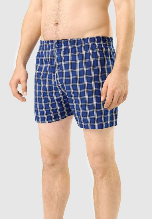 Calzoncillo bóxer de hombre en algodón con estampado de cuadros azules y blancos, ajuste holgado con botones.