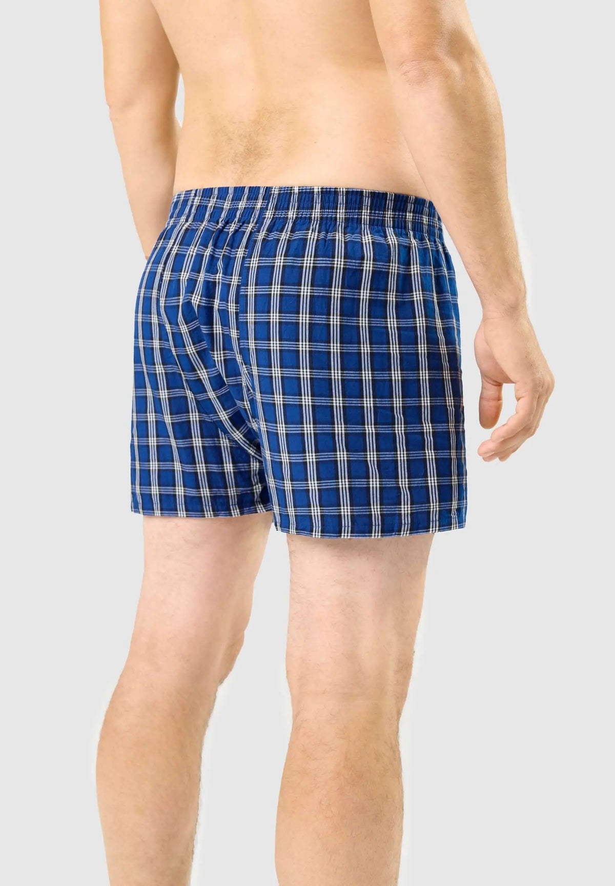 Calzoncillo bóxer para hombre de algodón con estampado de cuadros azules y blancos, ajuste holgado y cómodo.
