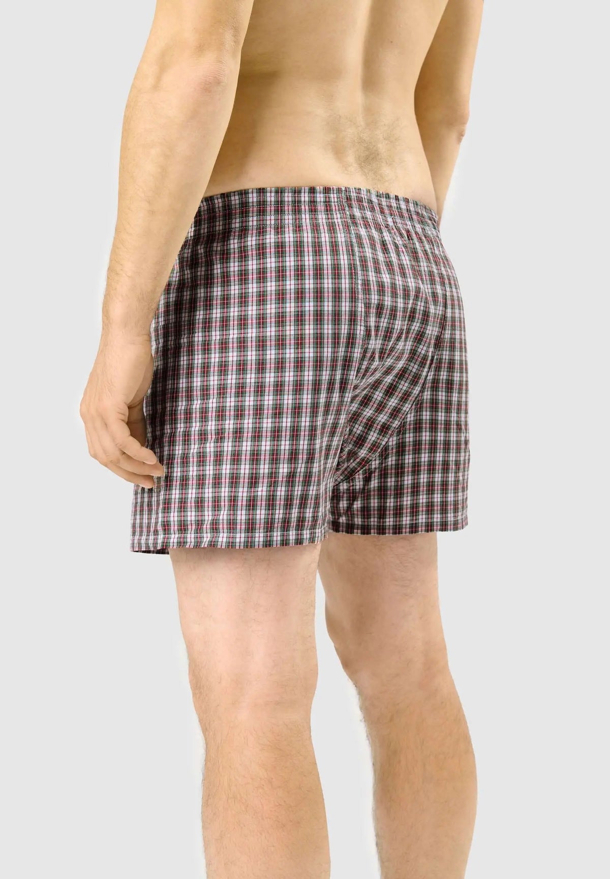 Calzoncillo bóxer de hombre en algodón con estampado de cuadros verdes, estilo holgado y cómodo.