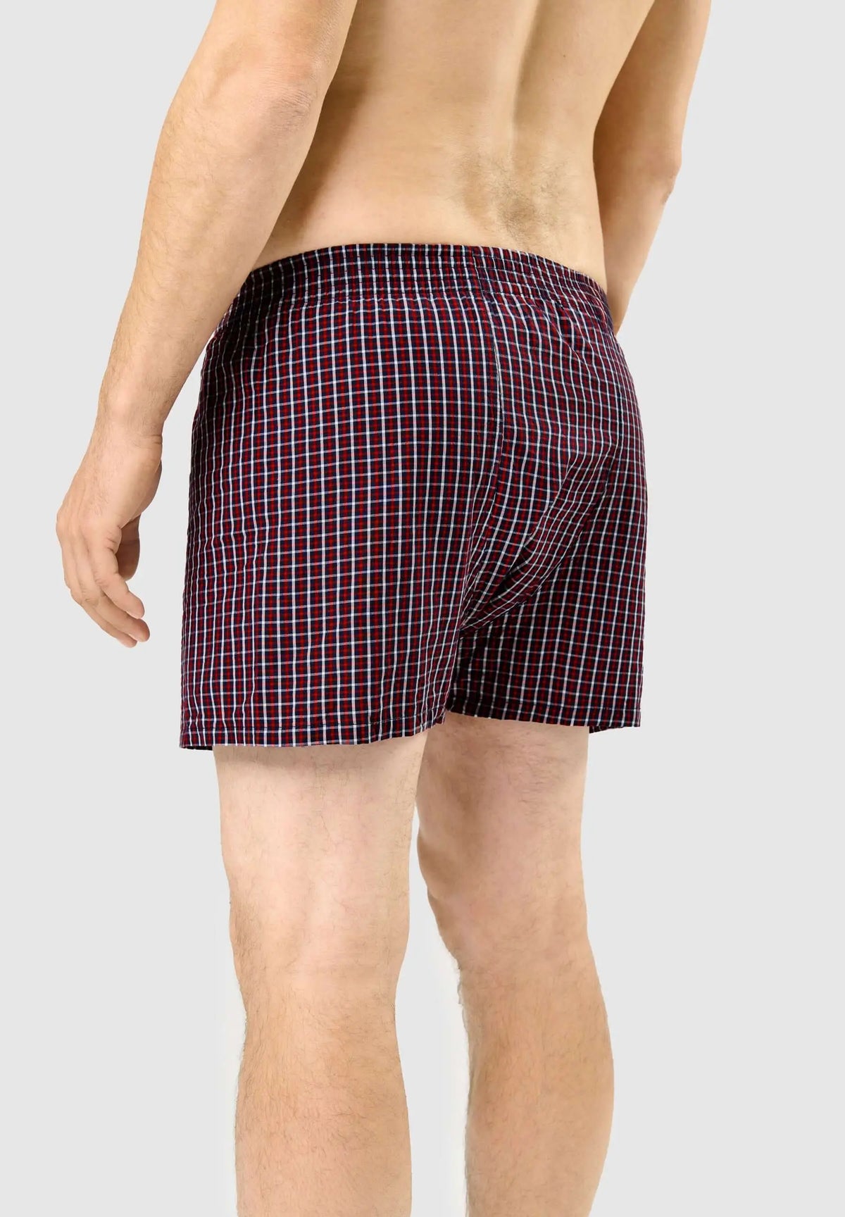 Calzoncillo bóxer para hombre de algodón con estampado de cuadros en rojo, ajuste holgado y cómodo.