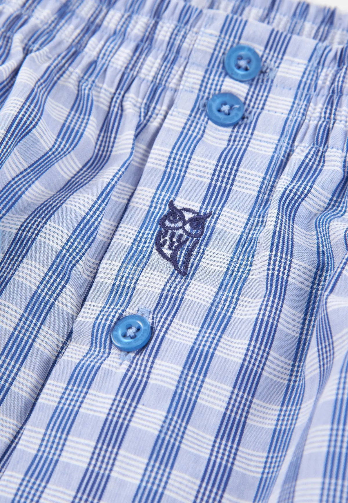 Pantalones cortos de cuadros azules y blancos, 100% algodón, con botones azules y bordado de búho.