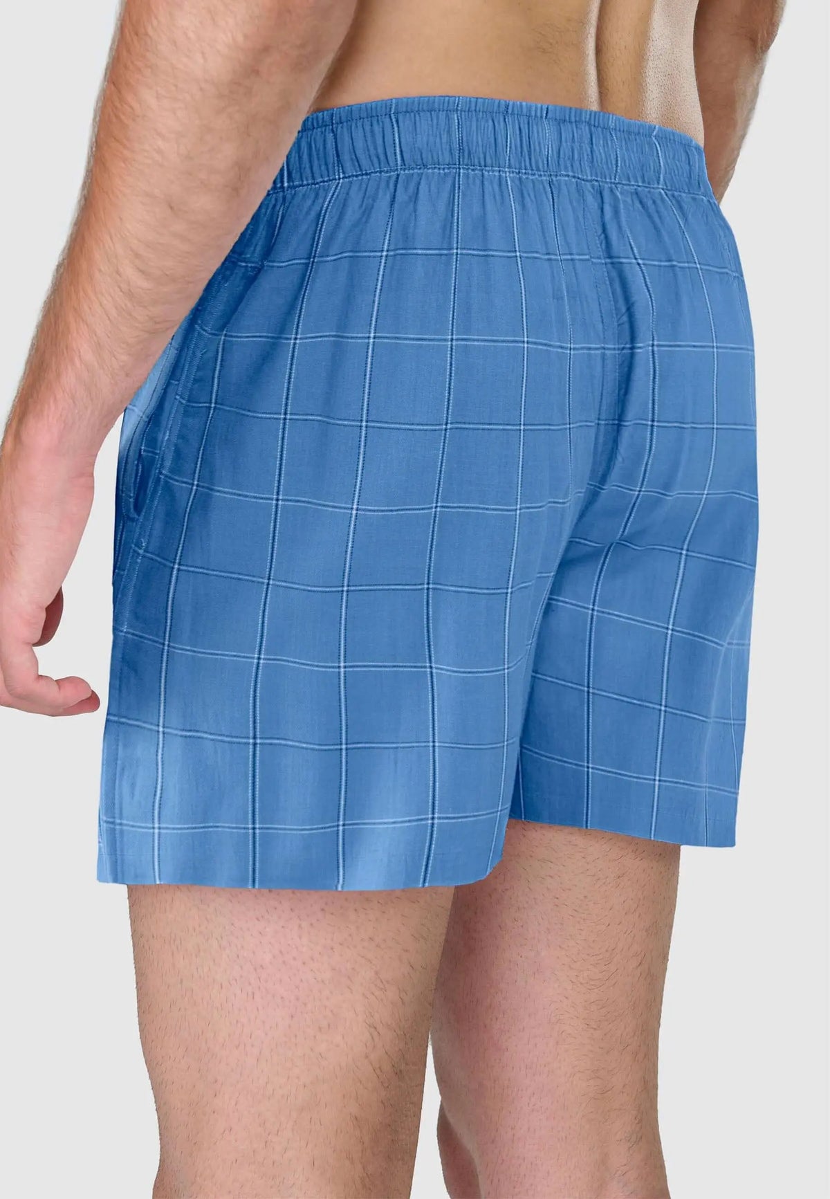 Calzoncillo bóxer de hombre en algodón popelín azul con estampado de cuadros, corte holgado y cintura elástica cómoda.