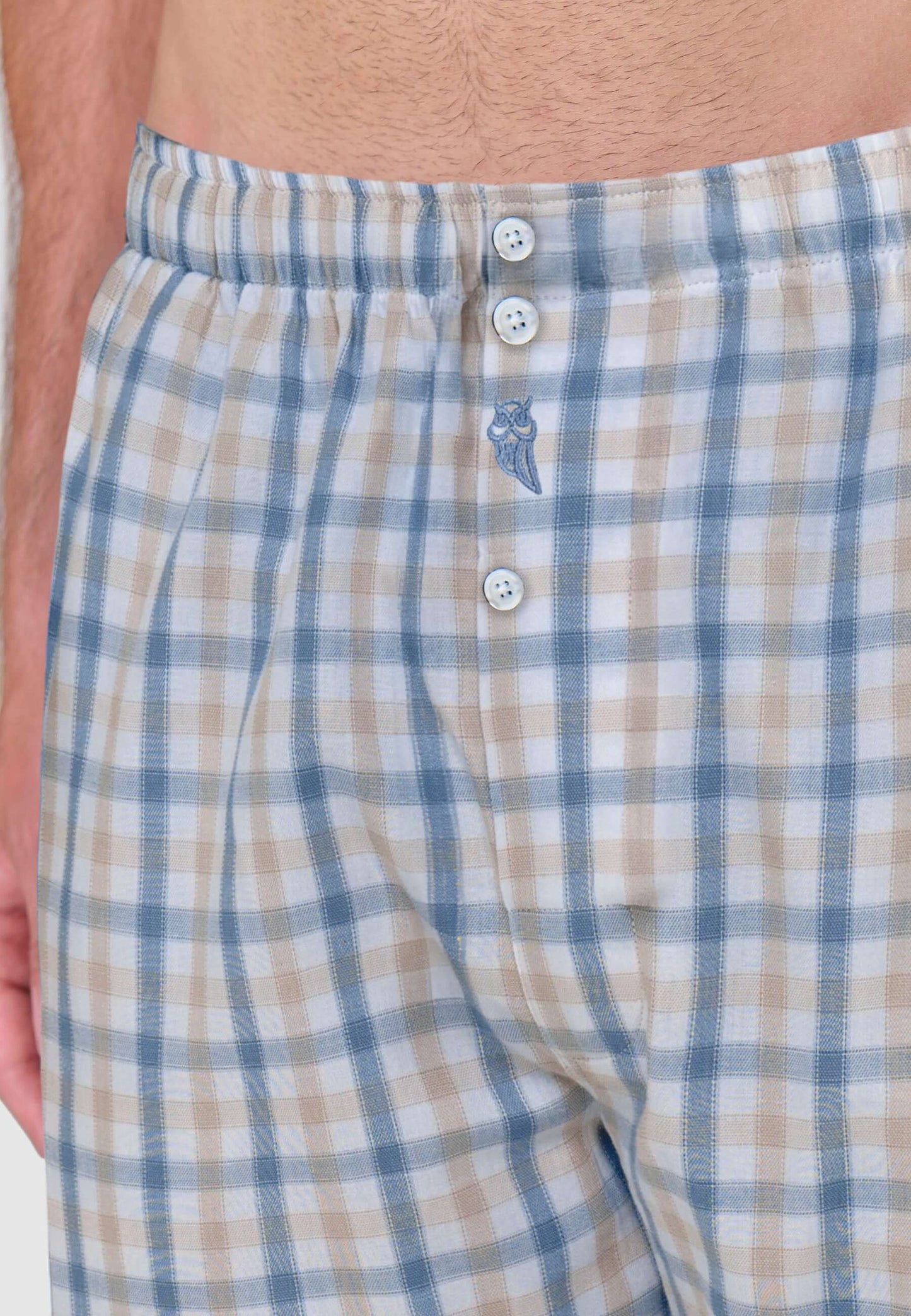 Calzoncillo bóxer de hombre de algodón en popelín con estampado de cuadros verdes y beige, corte holgado con botones.