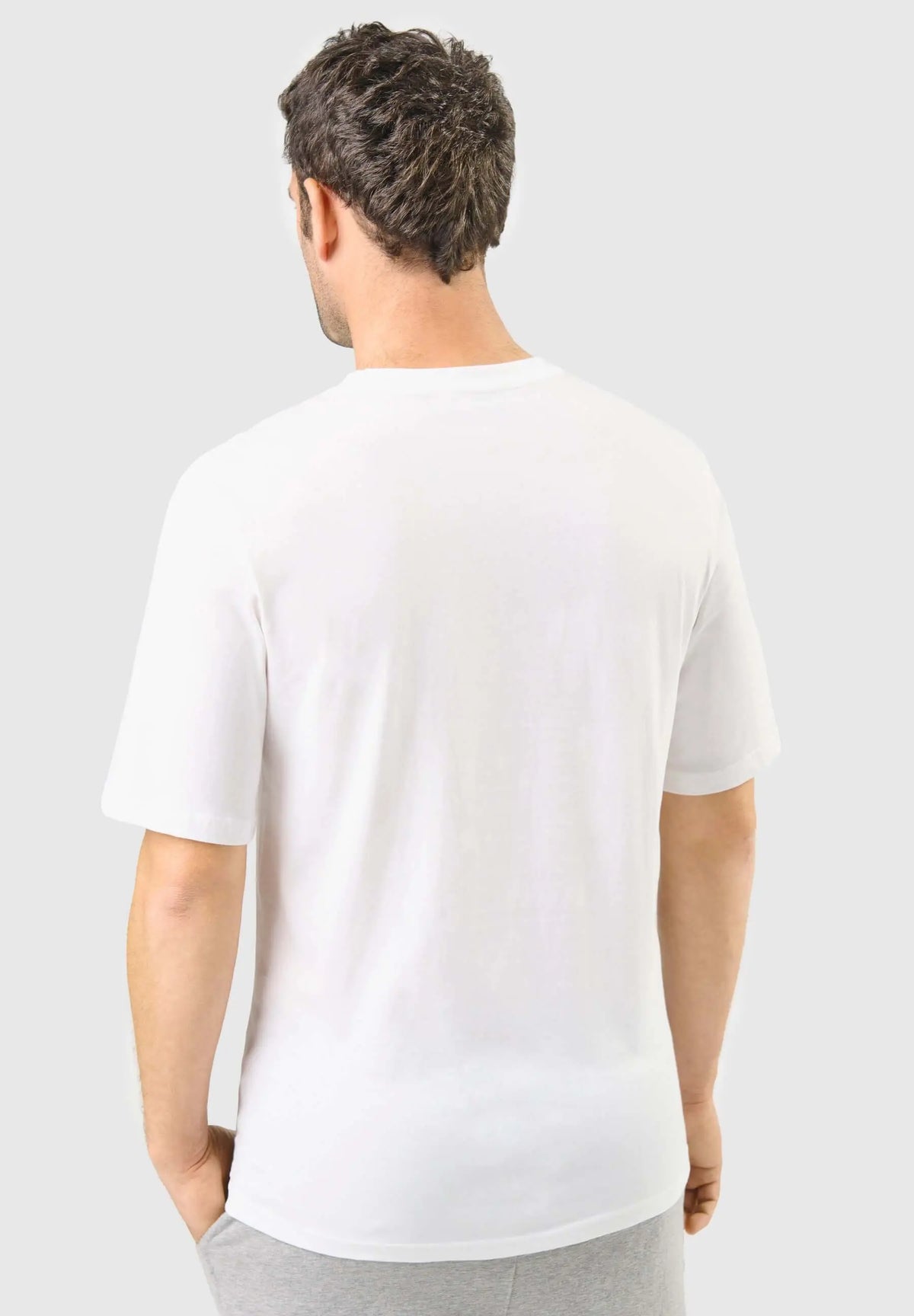Camiseta de pijama para hombre, de algodón blanco, manga corta, cuello redondo, corte clásico y ajuste cómodo.