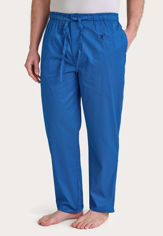 Pantalón de pijama largo para hombre en algodón popelín azul con estampado geométrico, ajuste holgado y cordón ajustable.
