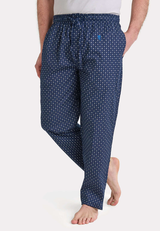 Pantalón largo de pijama para hombre en algodón popelín azul con estampado geométrico y ajuste holgado cómodo.