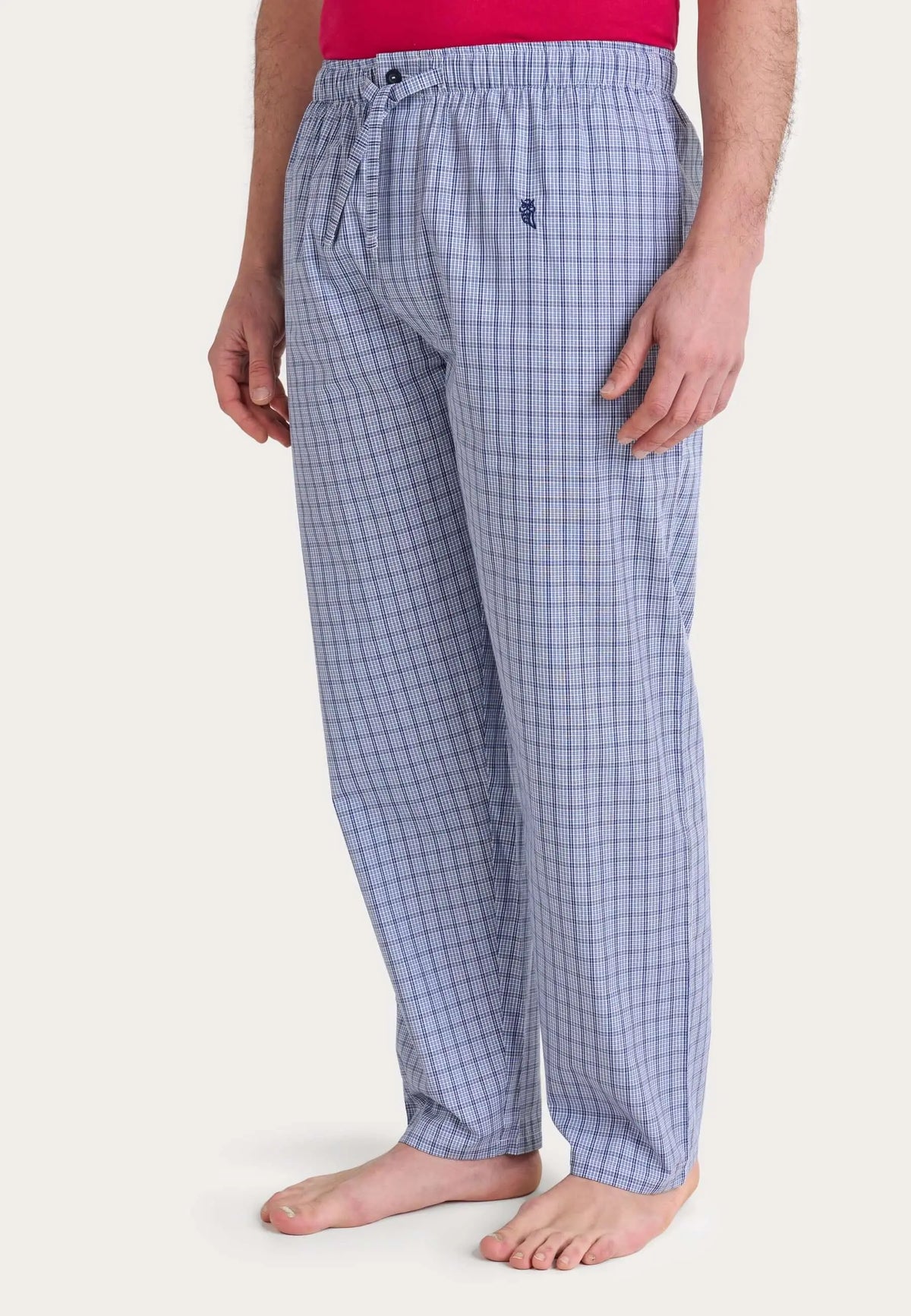 Pantalón de pijama largo para hombre en algodón popelín de cuadros azules, corte holgado con cintura elástica ajustable.