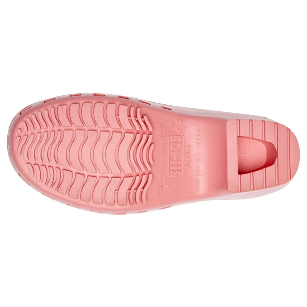 Bubblegum pink clog showing the textured, non-slip rubberized sole with molded brand and size markings.