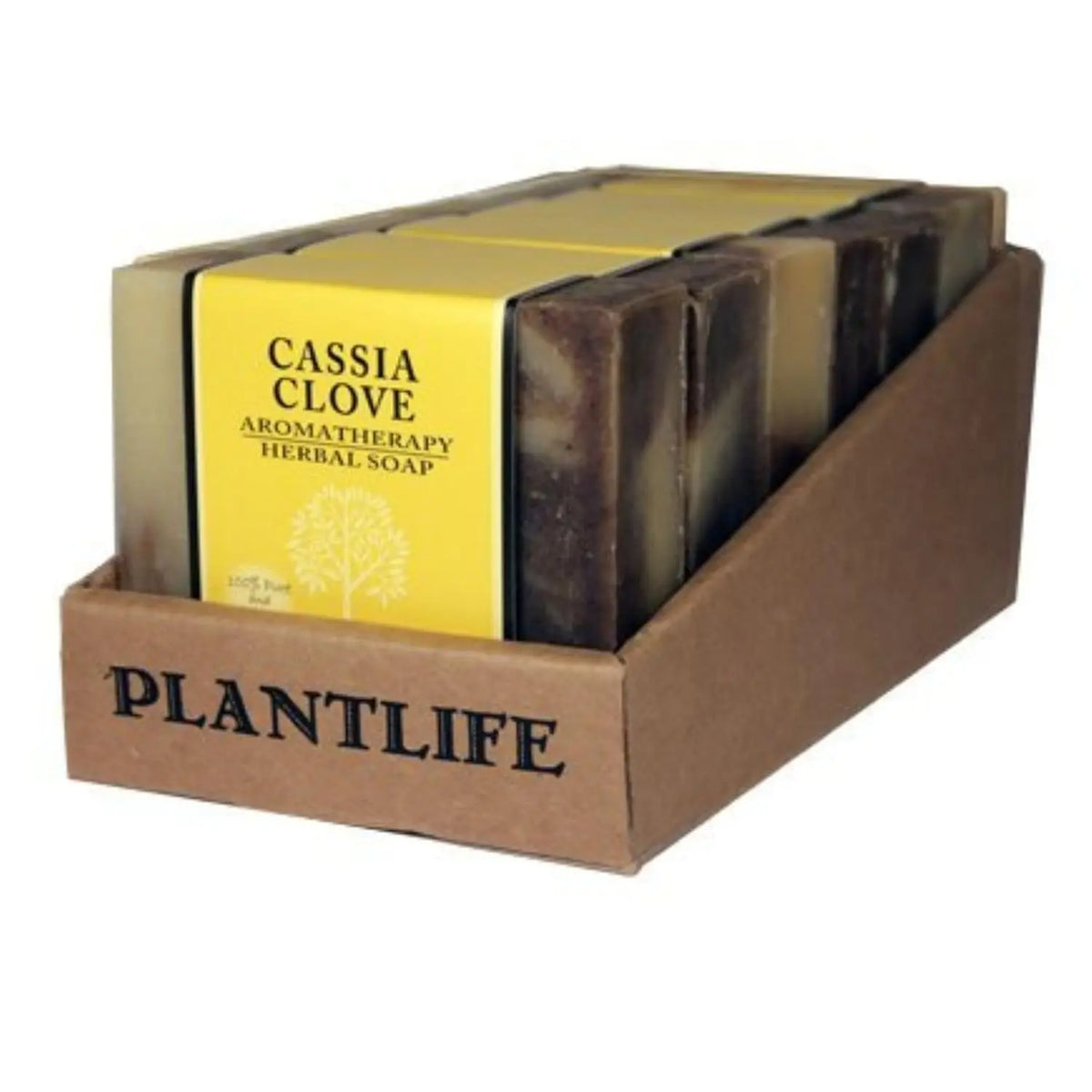 A cardboard tray filled with several rectangular Cassia Clove herbal soap bars wrapped in yellow labels.
