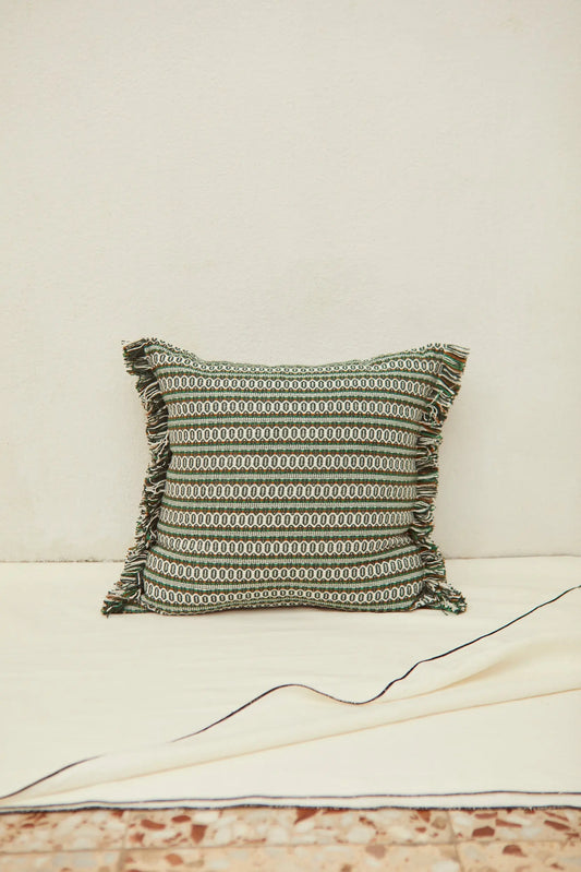 Square green retro-style cushion cover with a bird's-eye pattern and frayed edges, measuring 45cm x 45cm.