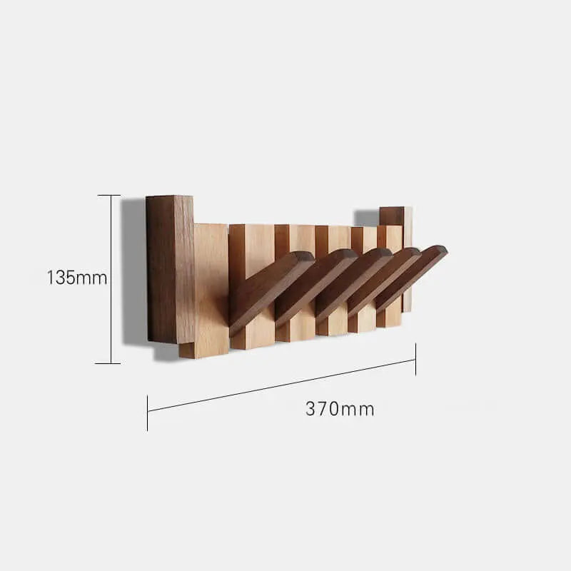 Perchero de pared de madera natural con estilo escandinavo, diseño plegable con ganchos móviles y medidas técnicas.