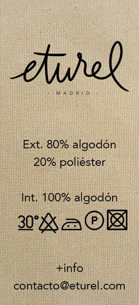 Tan-colored fabric tag with black text, fiber composition, laundry care symbols, and brand logo.