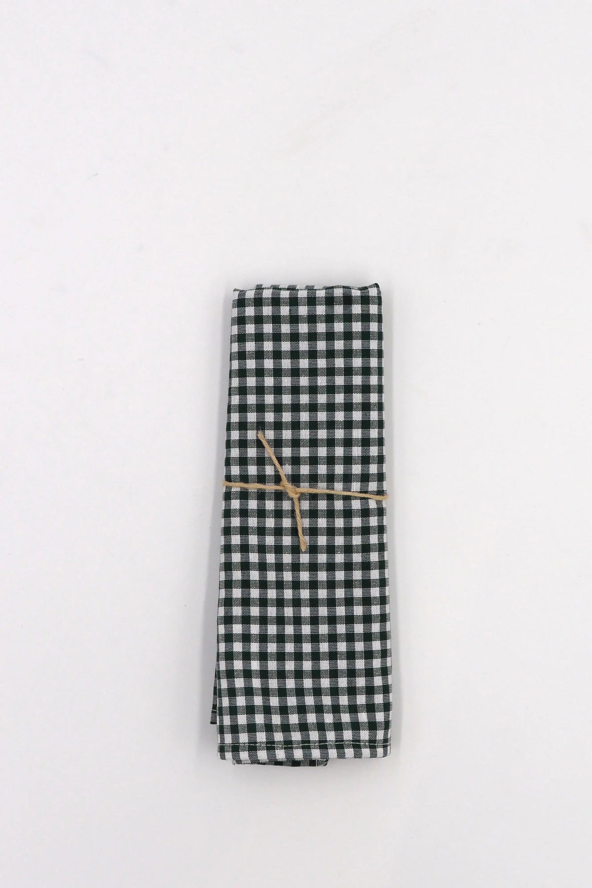 Two folded napkins with a black and white gingham check pattern, tied together with a simple rustic twine string.