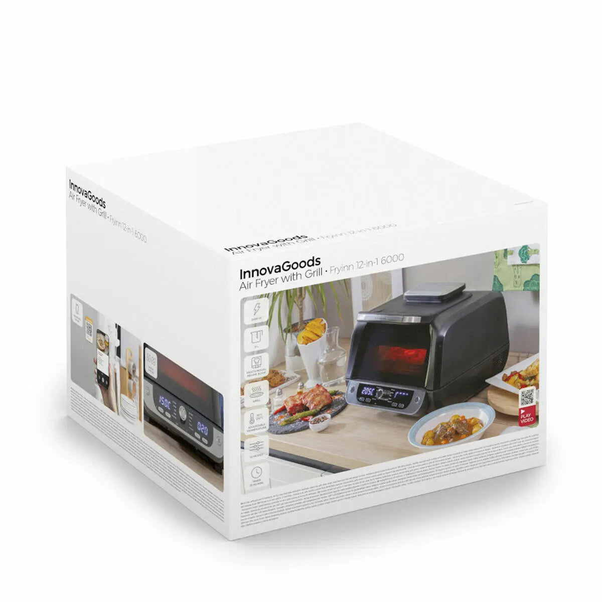 Caja de freidora de aire negra con grill, panel digital y accesorios, mostrada en una cocina con alimentos preparados.