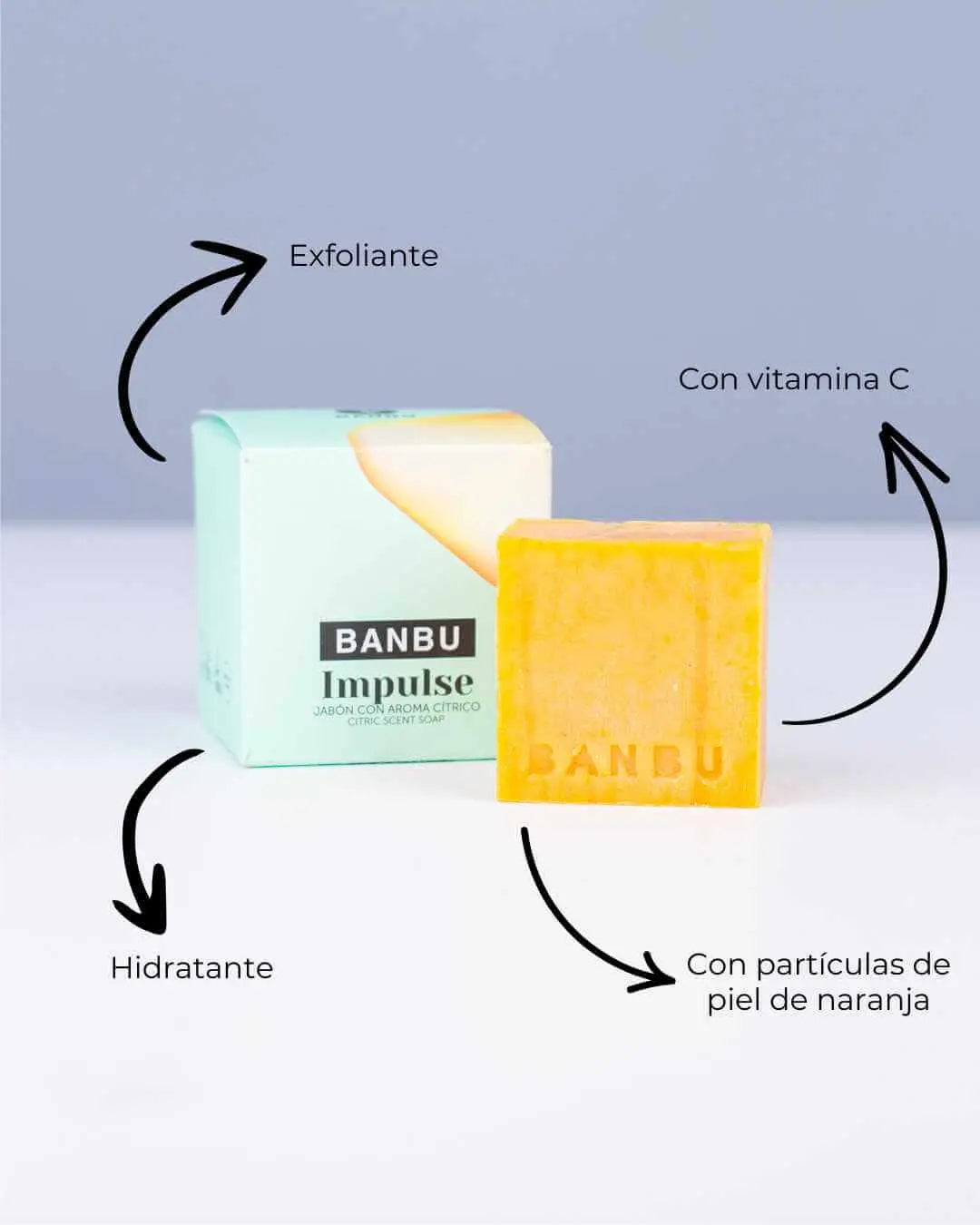 Jabón sólido naranja Banbu Impulse junto a su caja, con texto indicando que es exfoliante, hidratante y con vitamina C.