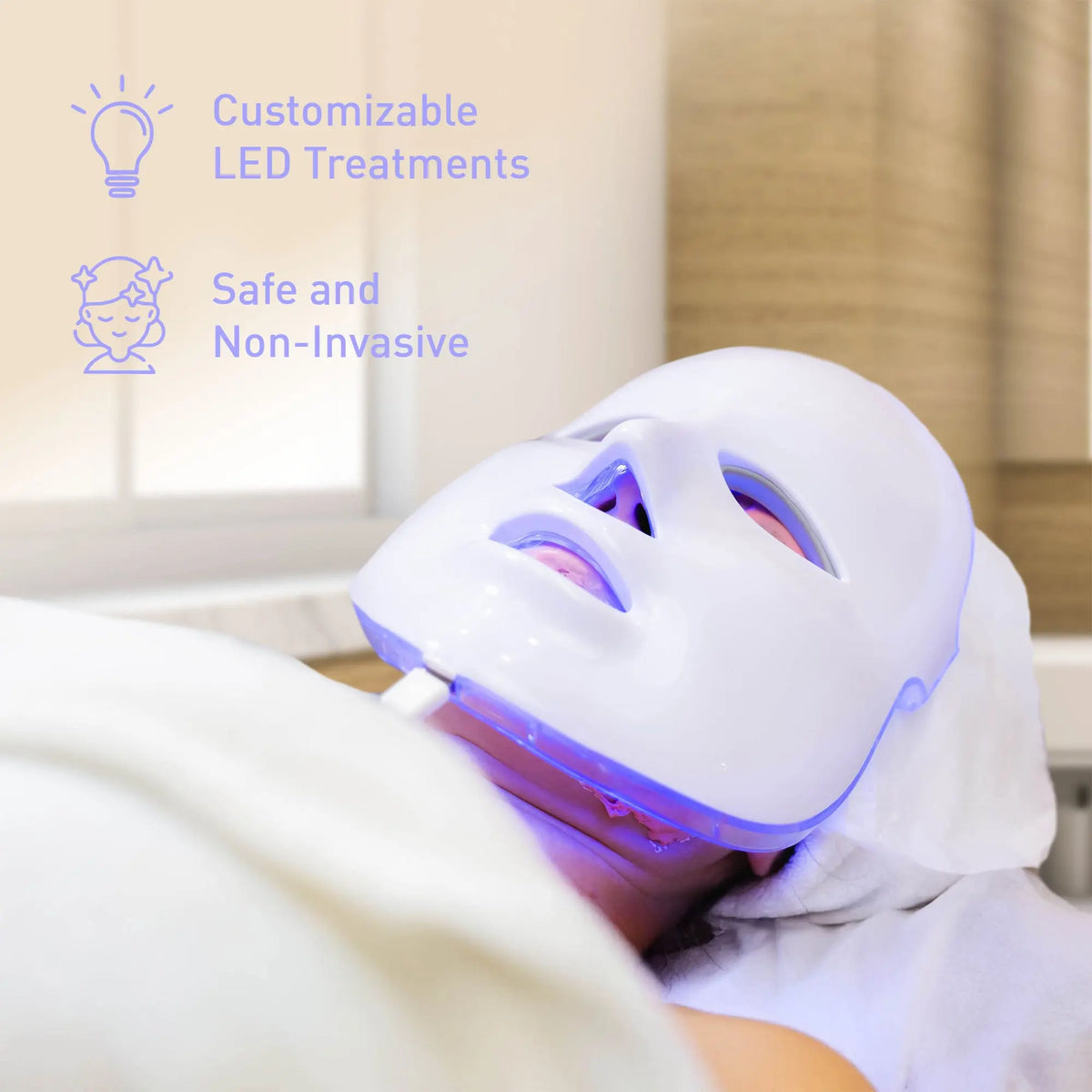 Person wearing a white LED light therapy face mask emitting blue light, with text overlay about non-invasive care.