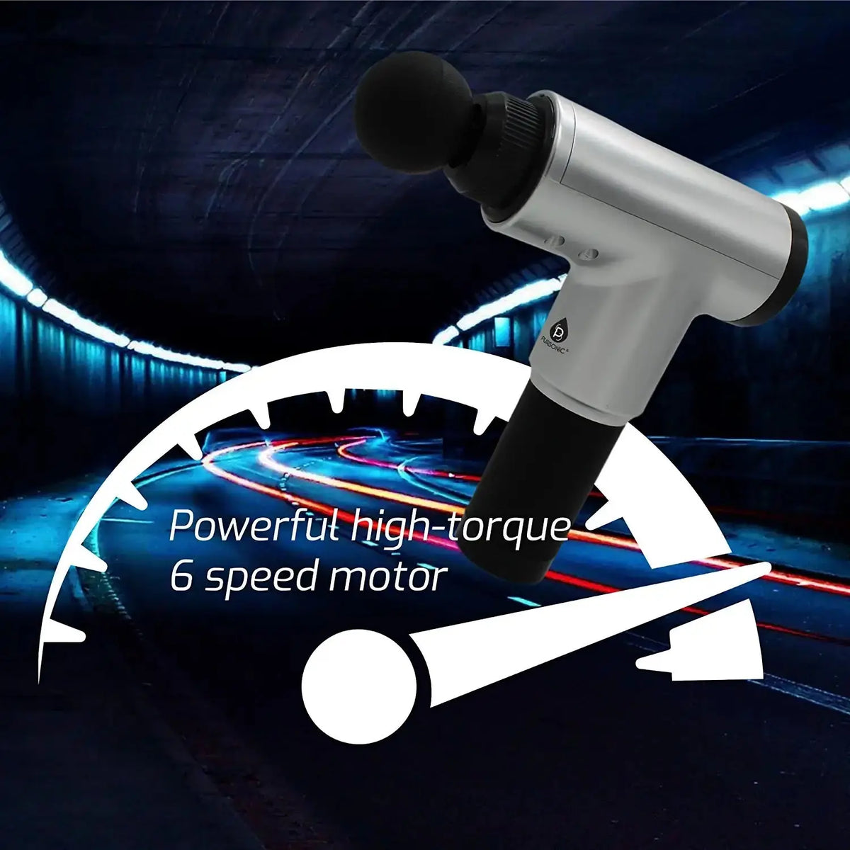 Silver and black cordless massage gun with a round head, displayed over a speedometer graphic on a road tunnel background.