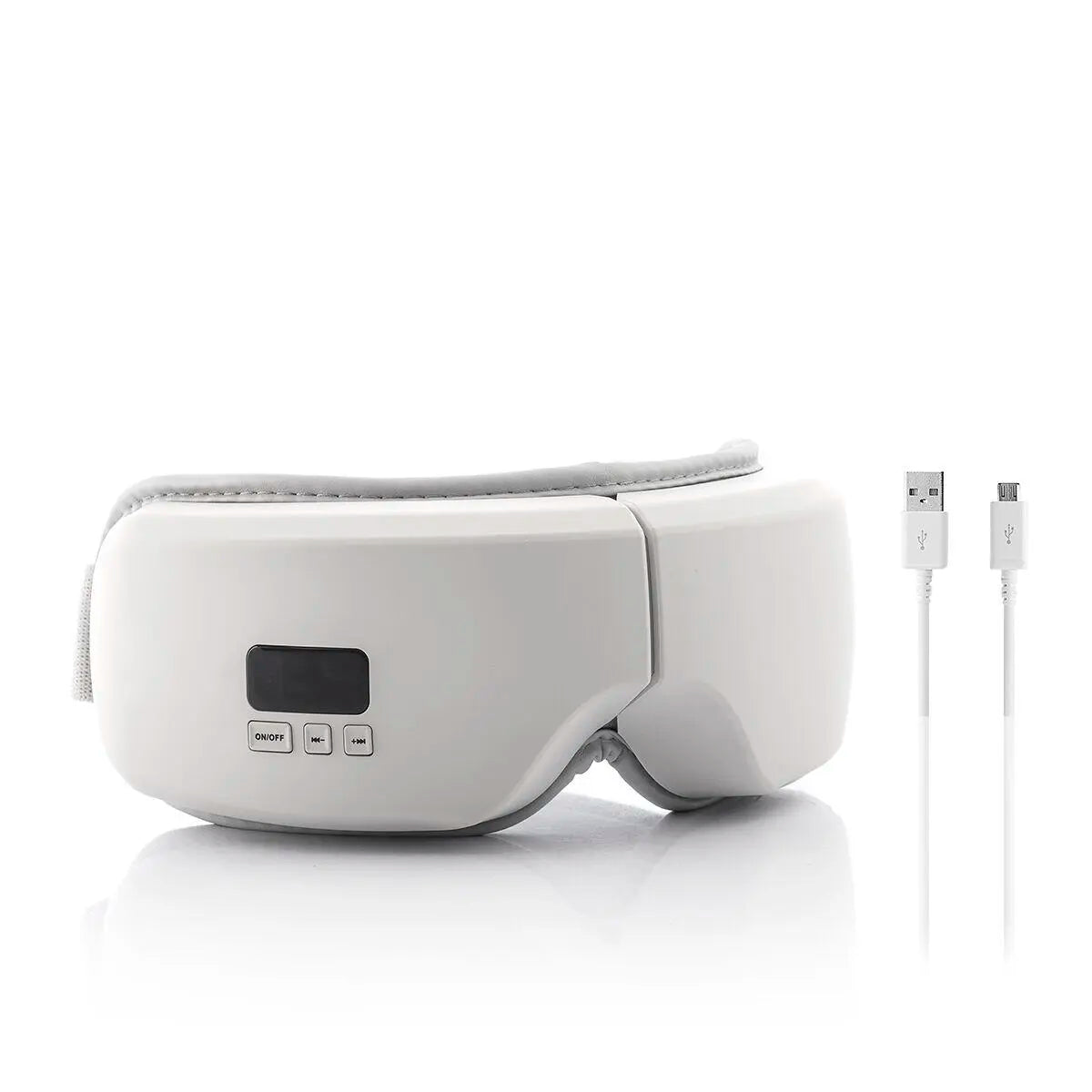 Masajeador de ojos blanco plegable con panel de control y cable de carga USB sobre fondo blanco.
