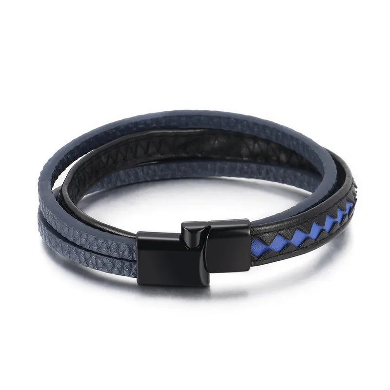 Pulsera Taurus · Pulsera de cuero auténtico trenzado con detalles azules y cierre de aluminio