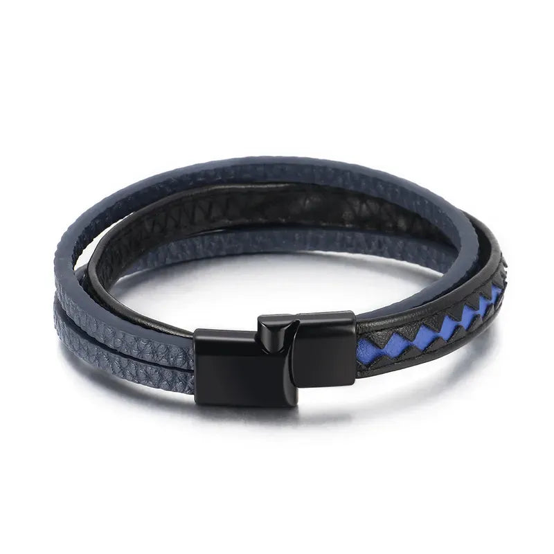 Pulsera Taurus · Pulsera de cuero auténtico trenzado con detalles azules y cierre de aluminio