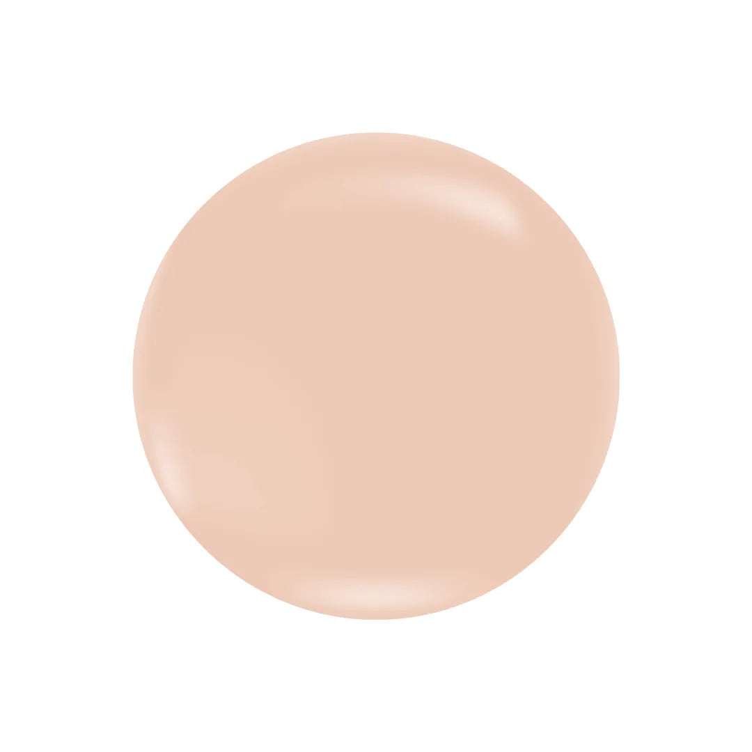 Smooth, circular swatch of creamy, light beige tinted moisturizer with a soft, uniform matte finish.