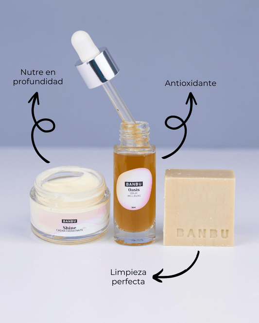 Pack facial Banbu: crema hidratante, sérum en gotero y jabón sólido sobre fondo lila, resaltando sus beneficios.