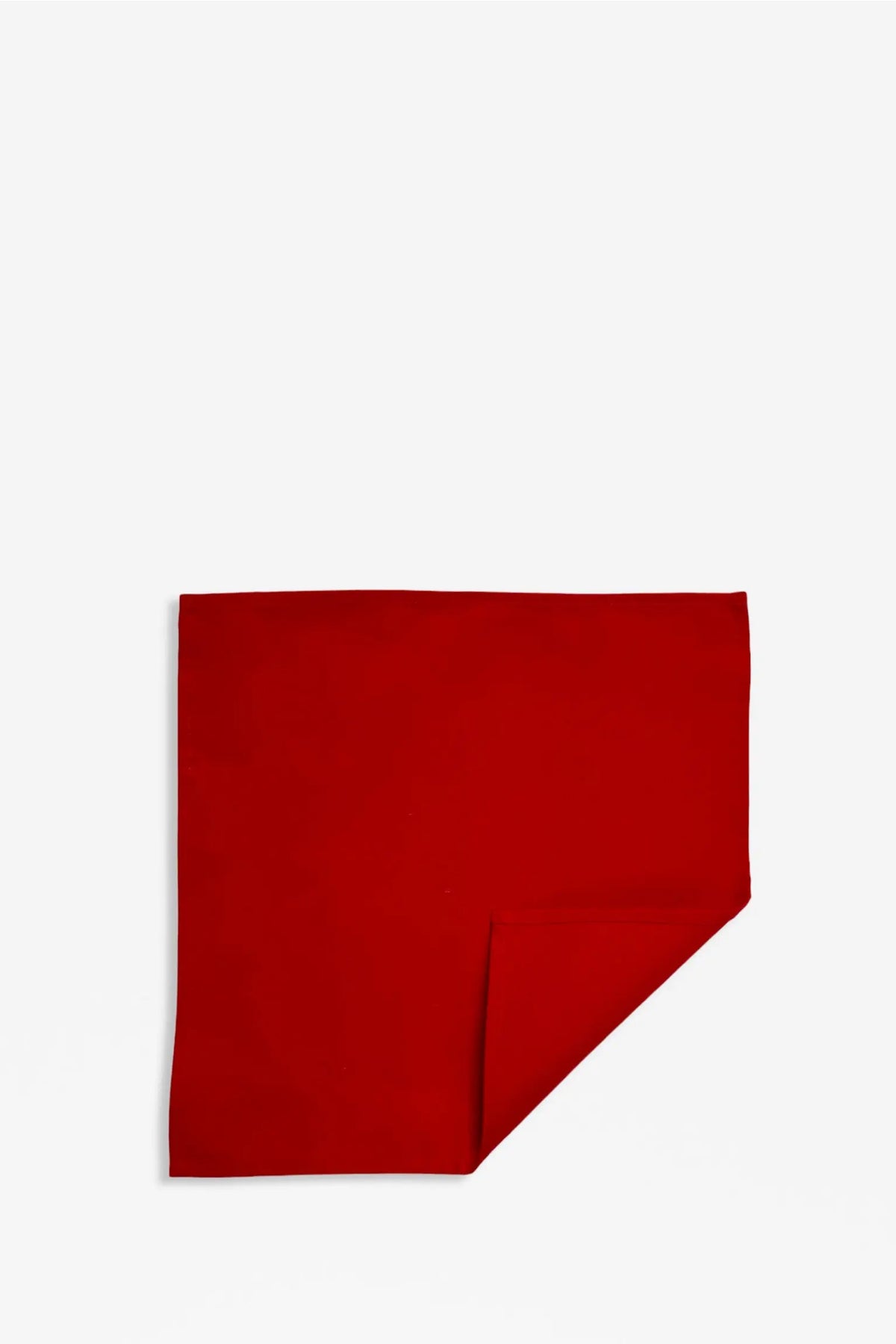 Pack of two solid red square canvas napkins with a folded corner, featuring a minimalist design on a white background.
