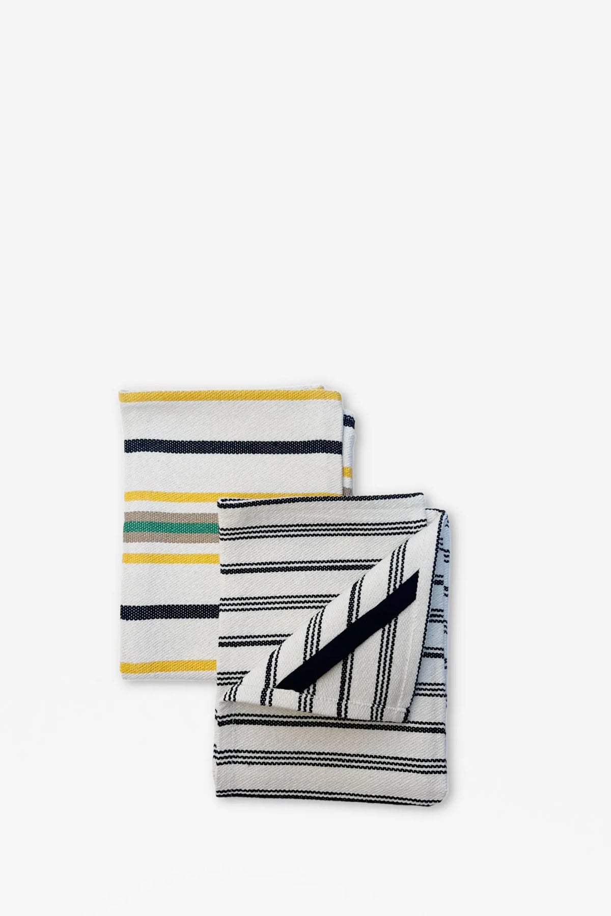 Set de dos paños de cocina de loneta con diseño a rayas en blanco, negro, amarillo y verde, estilo artesanal.