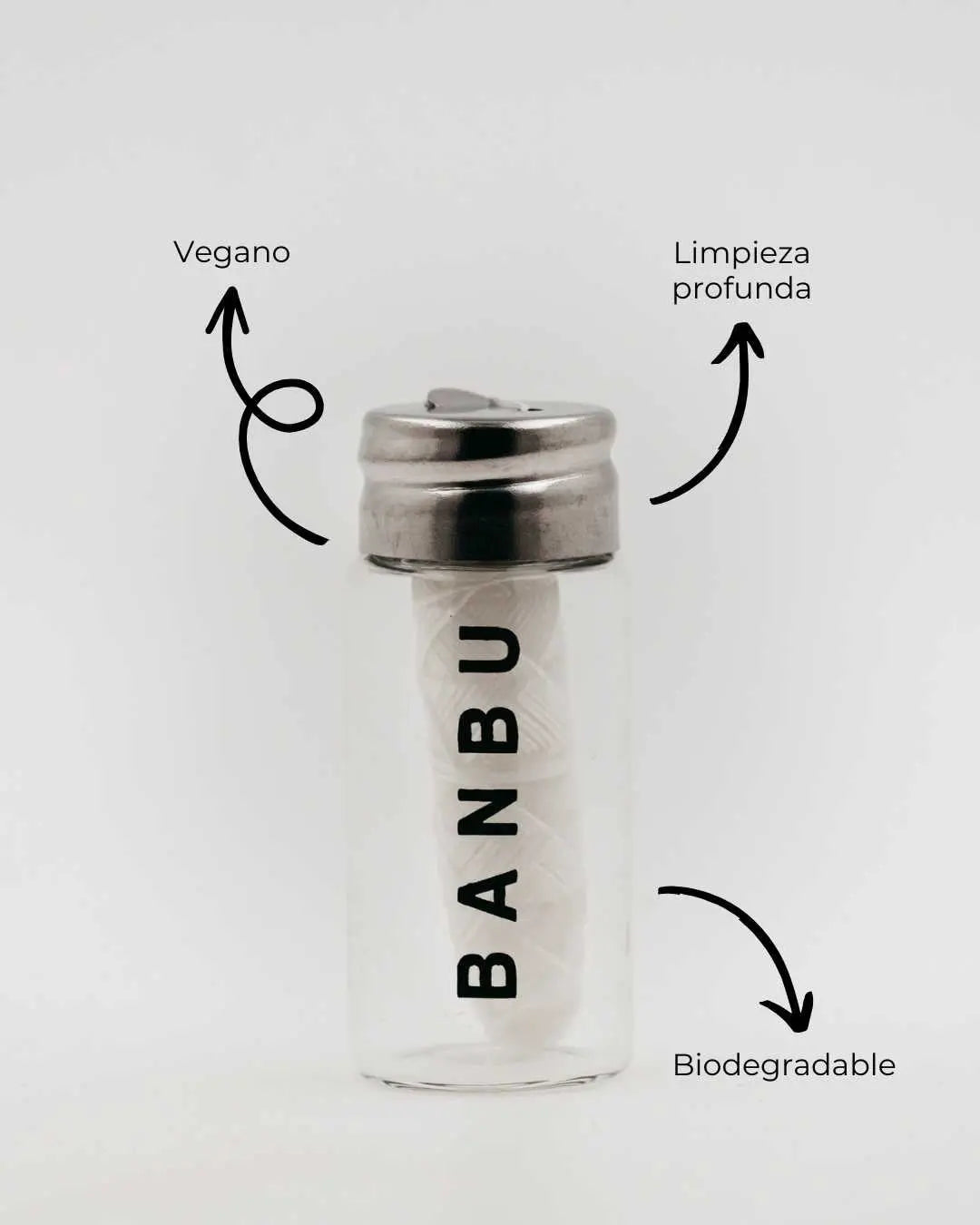 Hilo dental vegano Banbu en frasco de vidrio con tapa metálica. Producto ecológico, biodegradable y de limpieza eficaz.