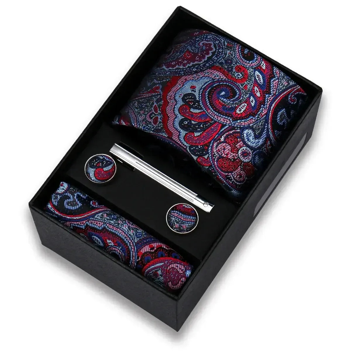 Set de corbata, pañuelo y gemelos con estampado paisley en tonos azul y morado, elegante y con acabado de seda.