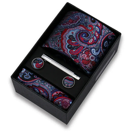 Set Corbata Paisley Azul Morado con pañuelo, gemelos y pasador en caja elegante.
