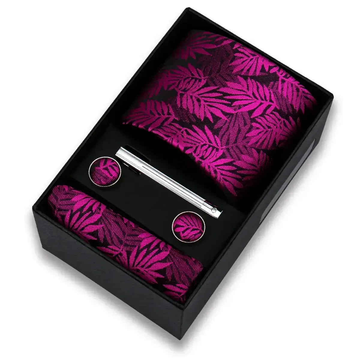 Set de corbata, pañuelo y gemelos magenta con estampado de hojas, incluye pasador plateado en caja de regalo negra.