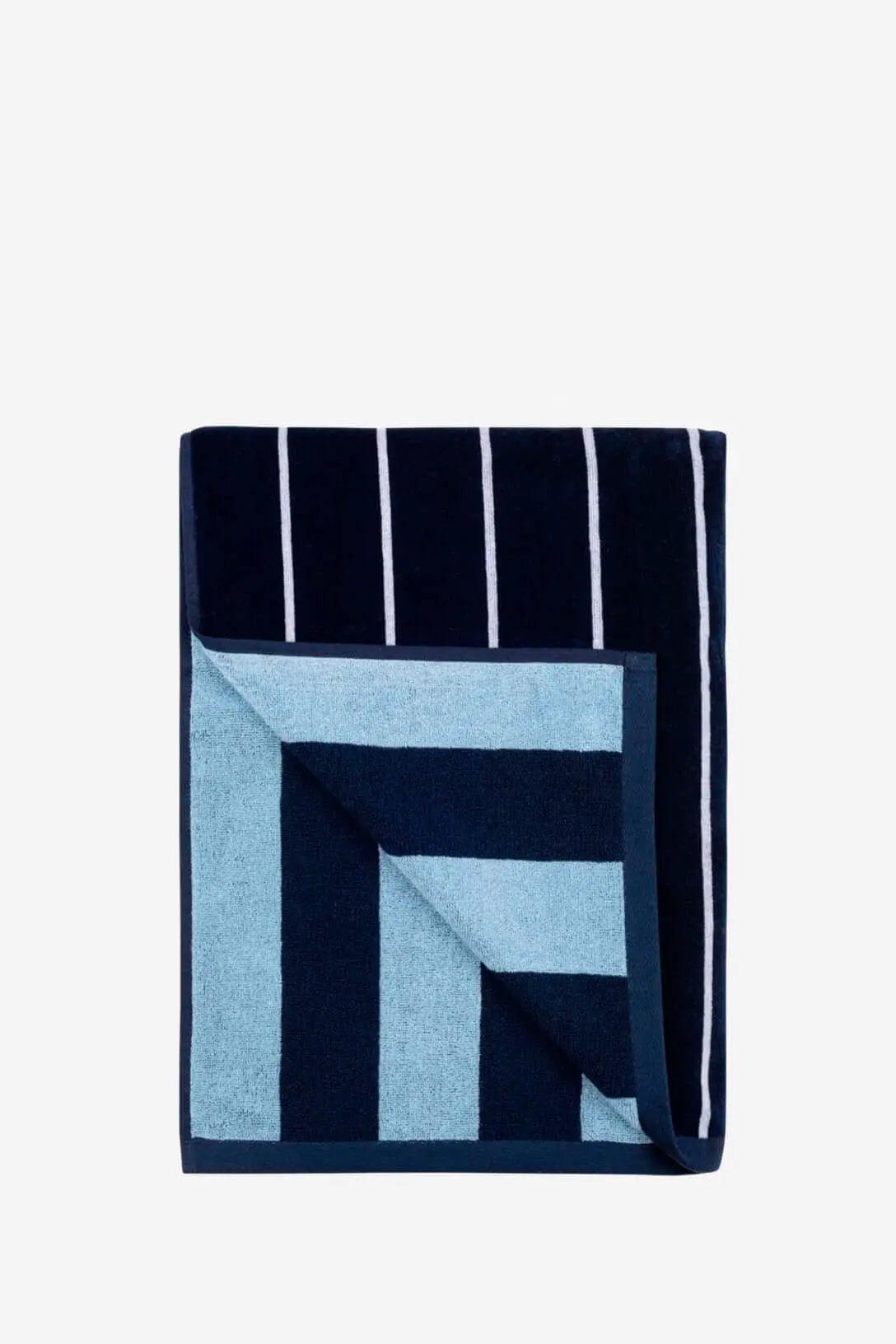 Folded rectangular beach towel with navy blue and sky blue stripes and a soft, plush textured finish.