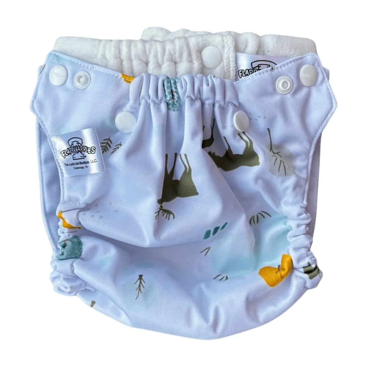 All-in-two diaper cover with white snap closures, elastic leg gussets, and a deer and forest-themed printed PUL cover.