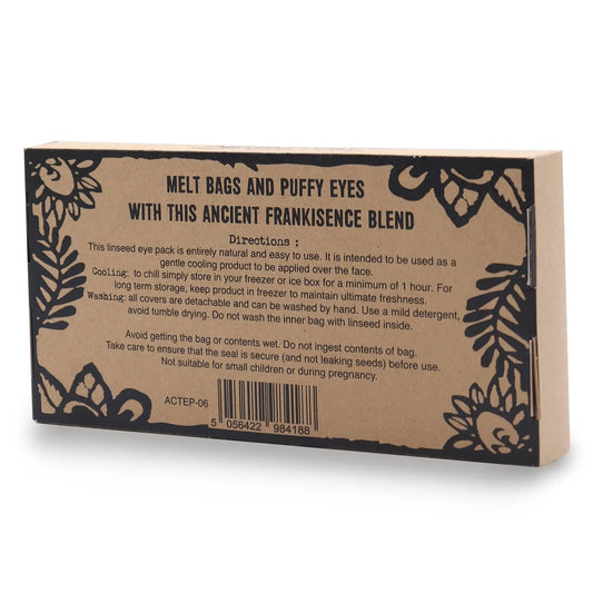 Caja rectangular de cartón kraft con instrucciones en negro y motivos florales en los bordes para almohada de ojos.