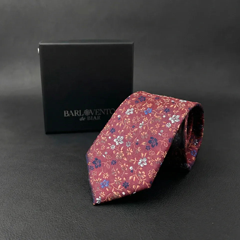 Auvergne · corbata floral de color rojo intenso