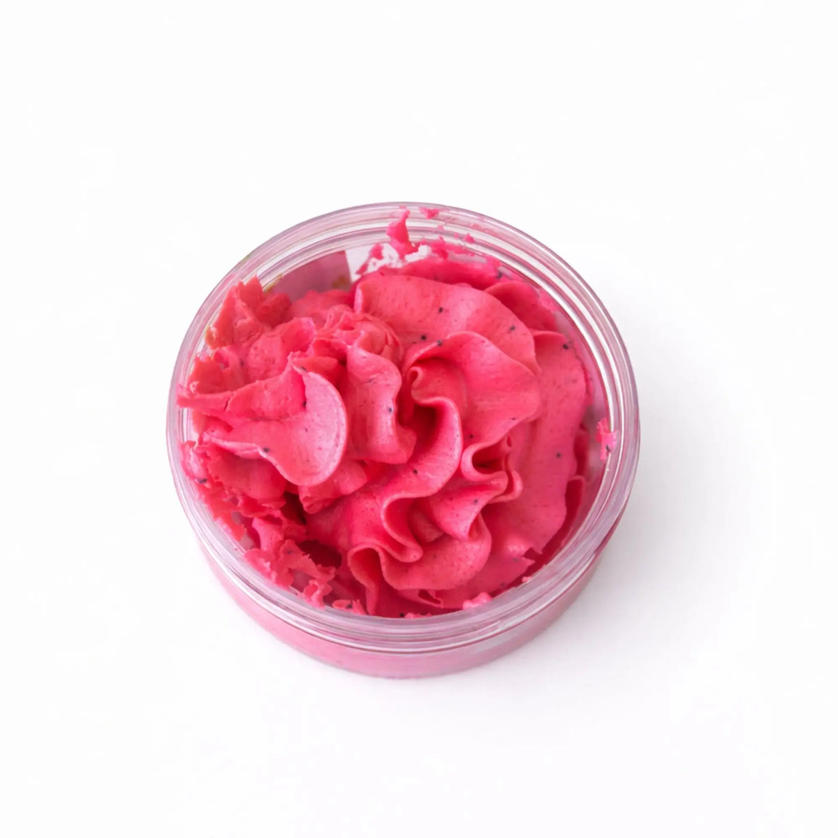 Crema corporal rosa intenso en frasco transparente, textura suave y cremosa, ideal para hidratación profunda.
