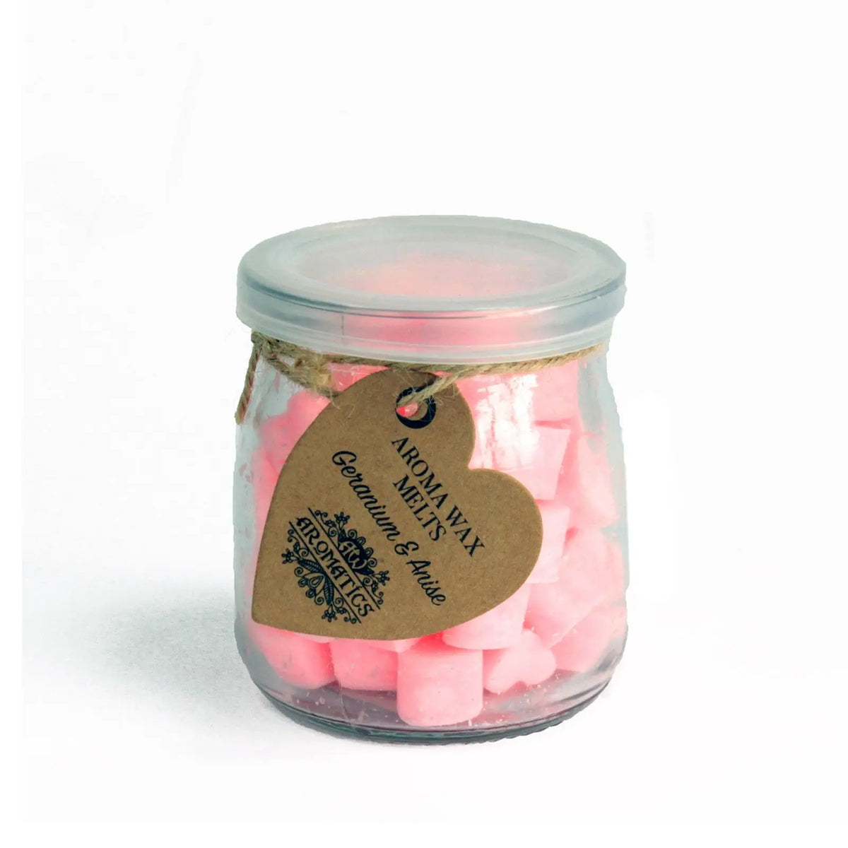 Frasco de vidrio con tapa conteniendo corazones de cera aromática rosa y etiqueta de cartón en forma de corazón.