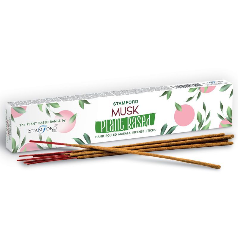 Incienso de almizcle Stamford, palitos marrones de masala, envase blanco con diseño de hojas en colores pastel.