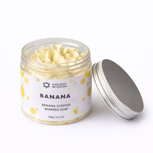Jabón batido de plátano, color amarillo, envase de 120 g con tapa plateada, aroma dulce y divertido.